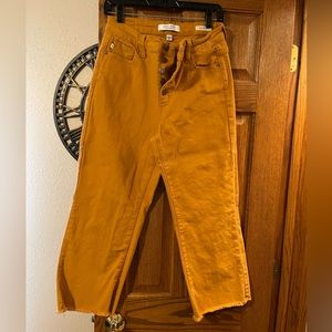 Woman’s crop gold jeans